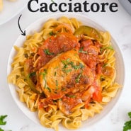 Chicken with tomato sauce, text overlay reads "the best chicken cacciatore."