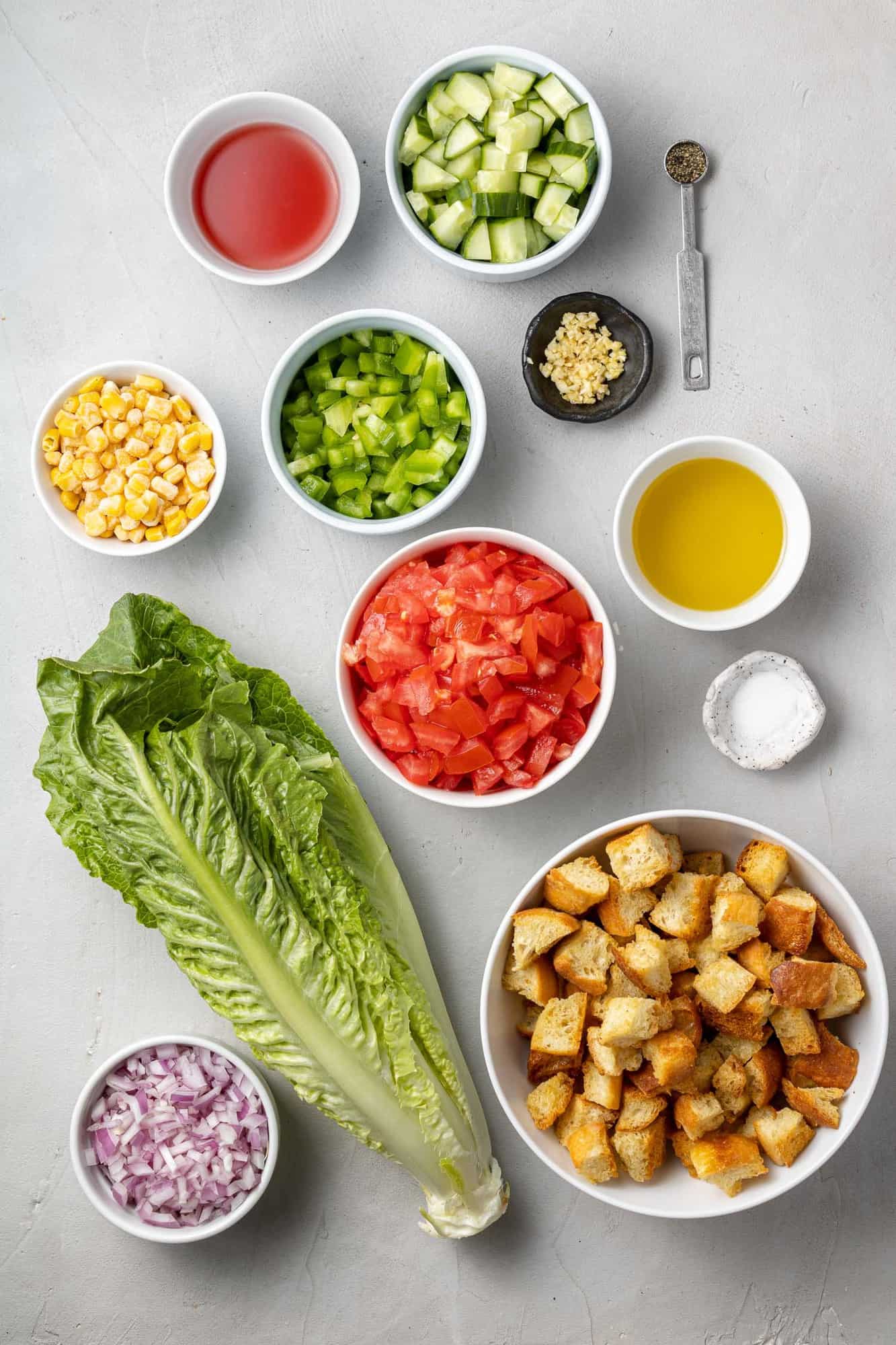 Overhead view of ingredients needed for salad recipe.