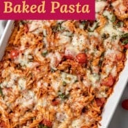 Pasta with cheese and pizza sauce, text overlay reads "pizza baked pasta."