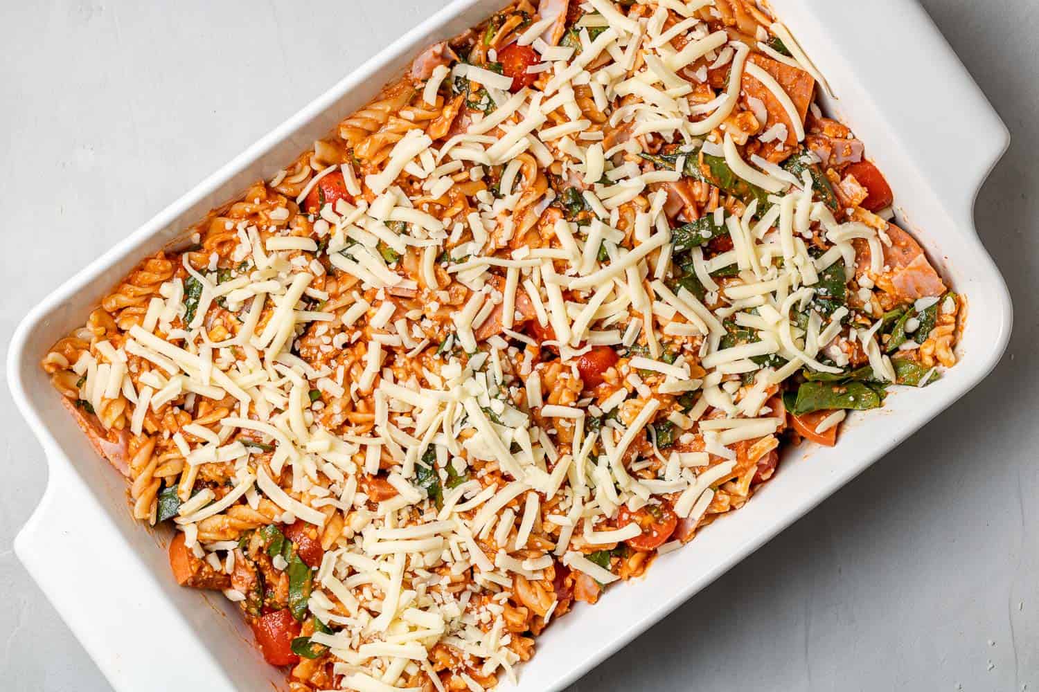 Unbaked pizza pasta casserole.