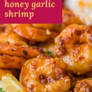 Shrimp, with a text overlay that reads "spicy honey garlic shrimp."