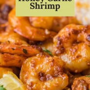 Shrimp, with a text overlay that reads "spicy honey garlic shrimp."