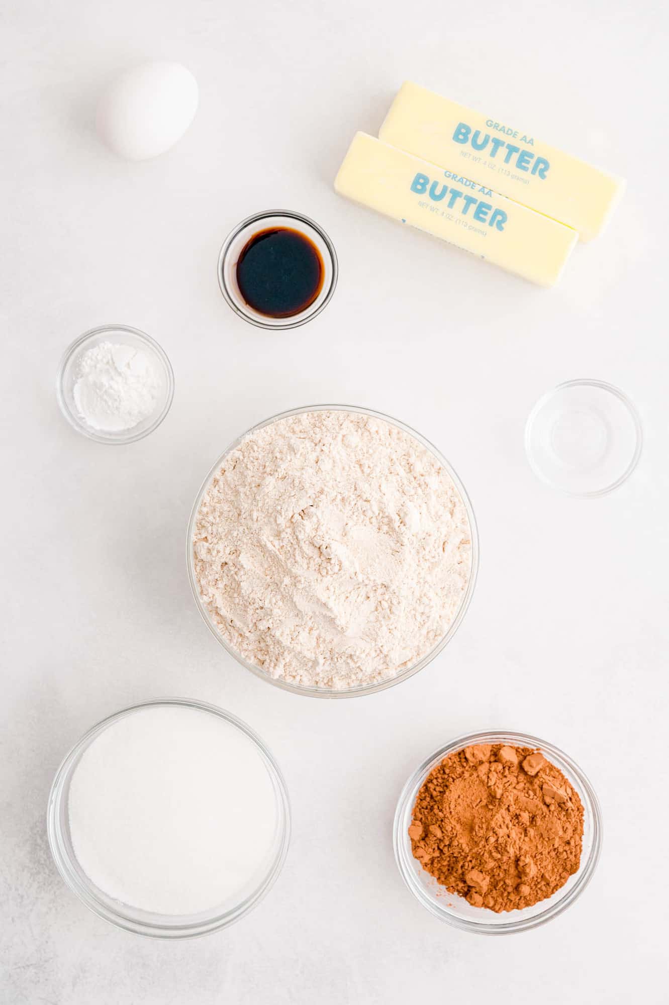 Ingredients in separate bowls on a white background.