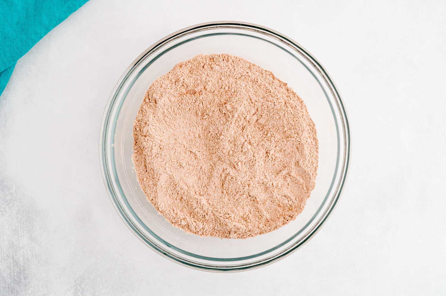 Dry ingredients in clear bowl.