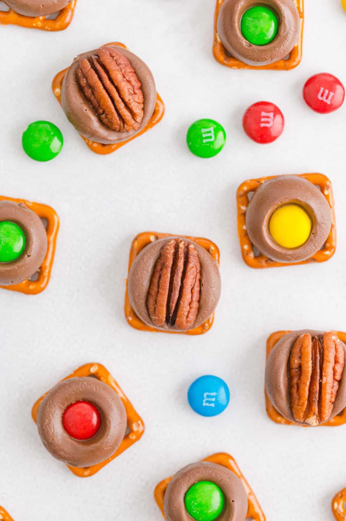 Rolo turtles on a white surface with M&Ms also visible.