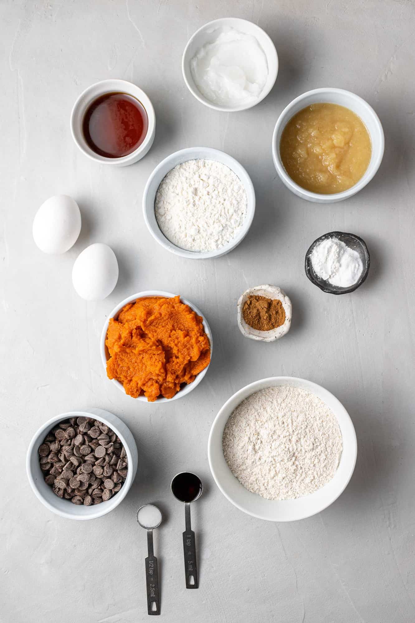 Overhead view of ingredients for pumpkin chocolate chip muffins.