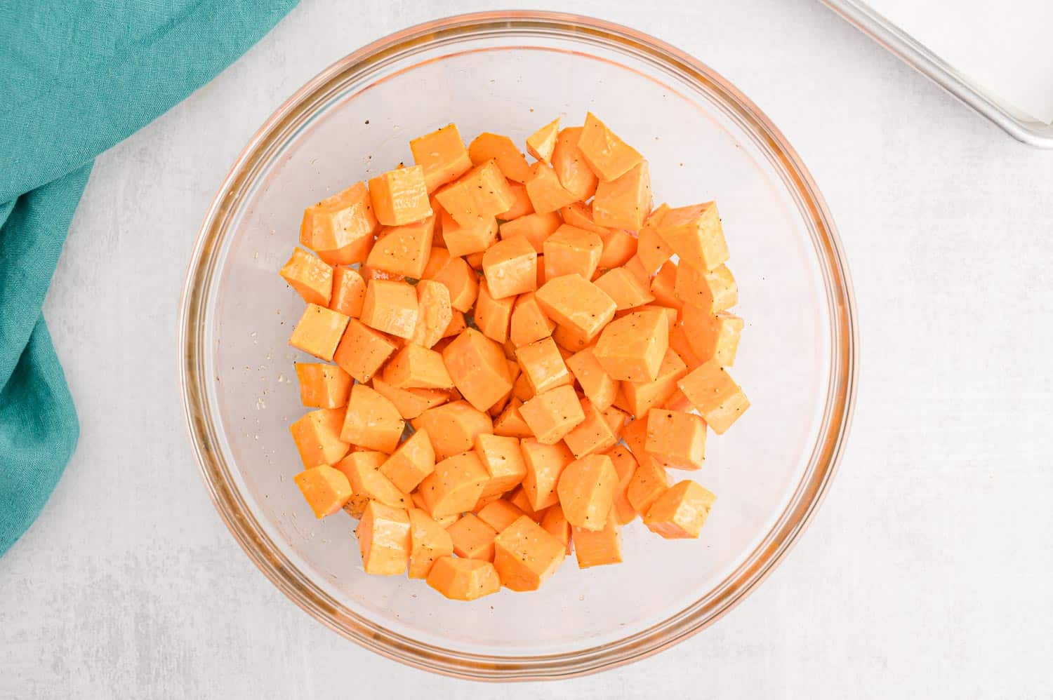 Sweet potatoes in a clear glass bowl.