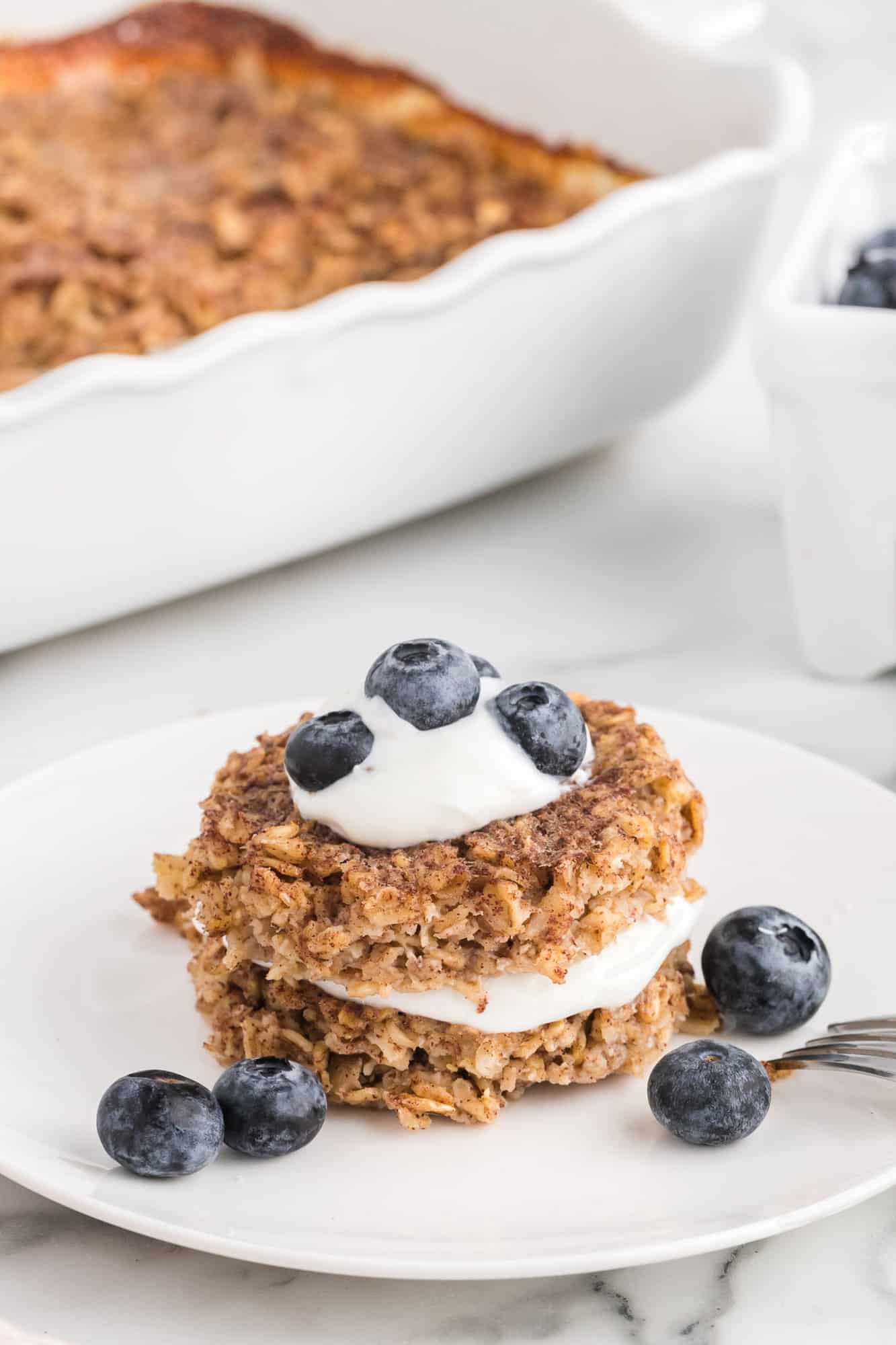 Baked oatmeal layered with yogurt and blueberries.