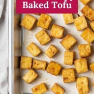 Tofu on a baking sheet, text overly reads "how to make crispy baked tofu."