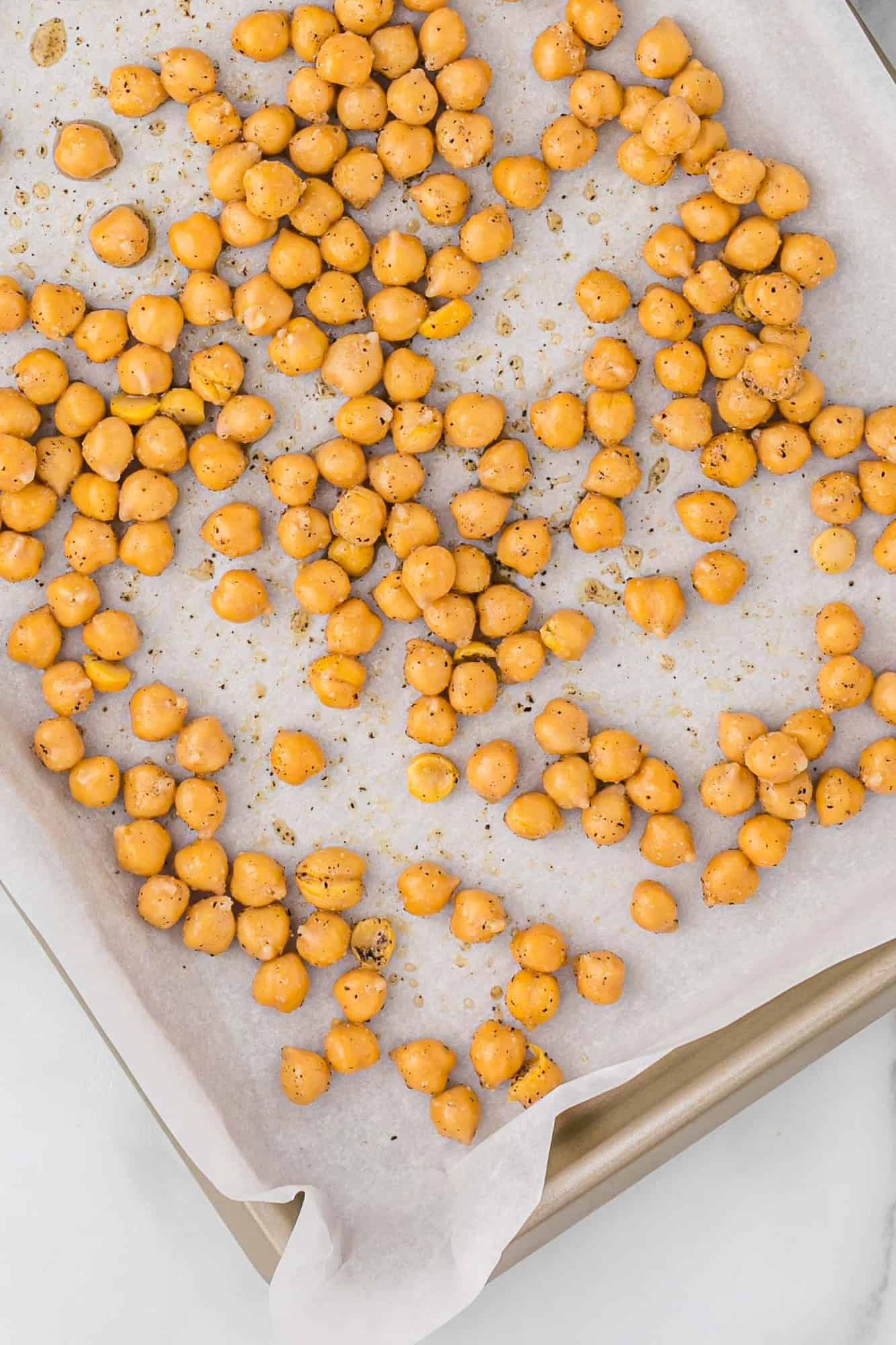 Chickpeas before roasting, on sheet pan.