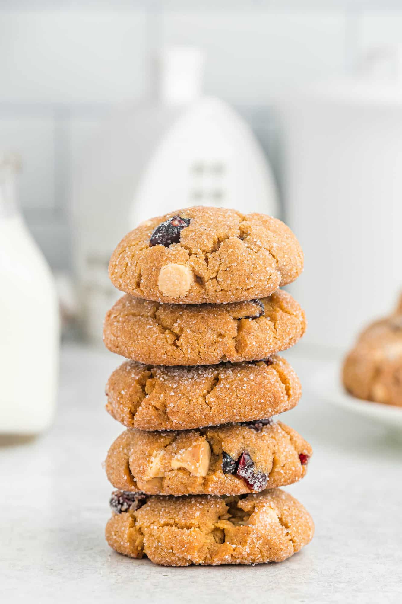 Tall stack of thick sugar rolled ginger cookies.