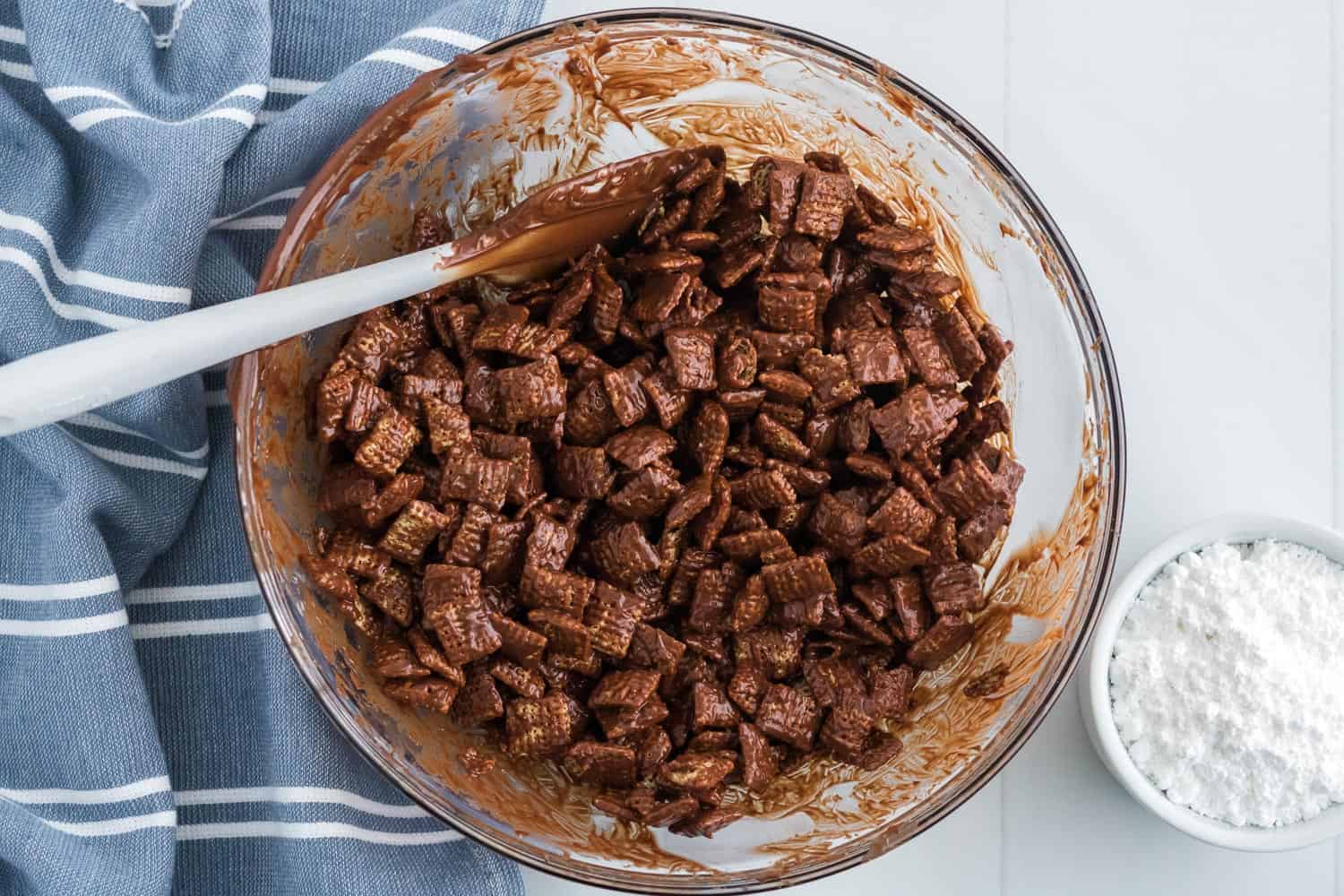 Chex cereal mixed with peanut butter and chocolate.