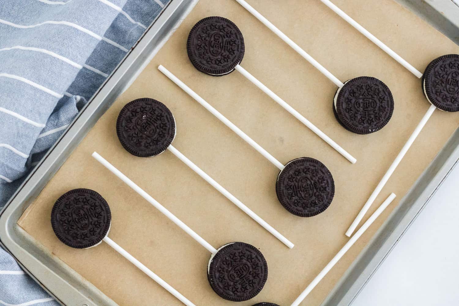 Oreos with sticks inserted in them.