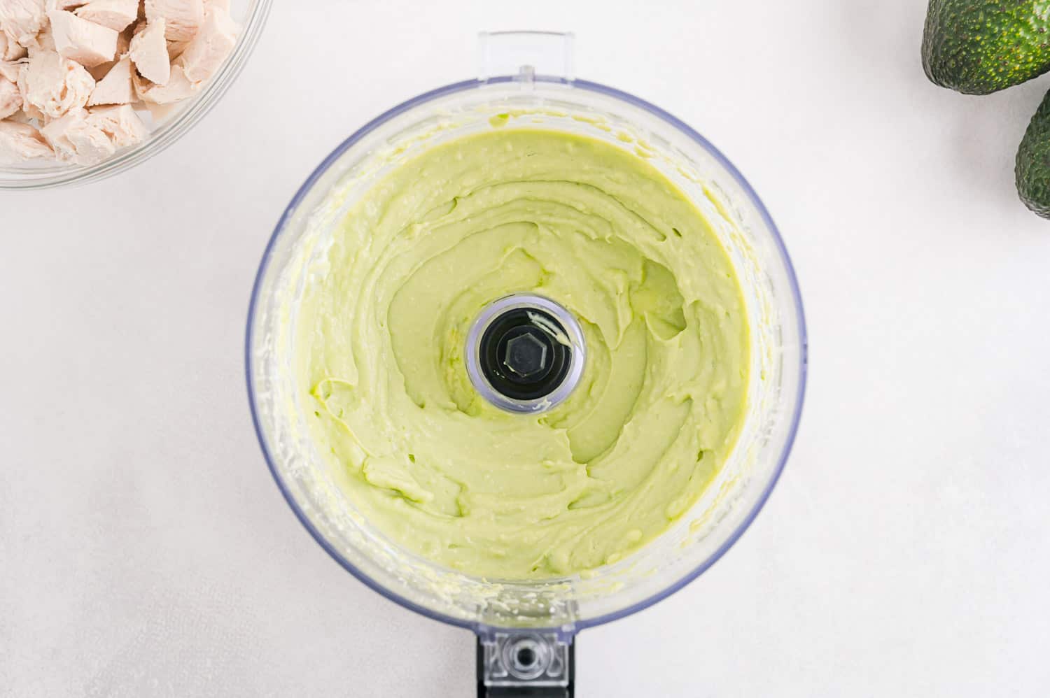 Smooth, light green dressing in food processor.