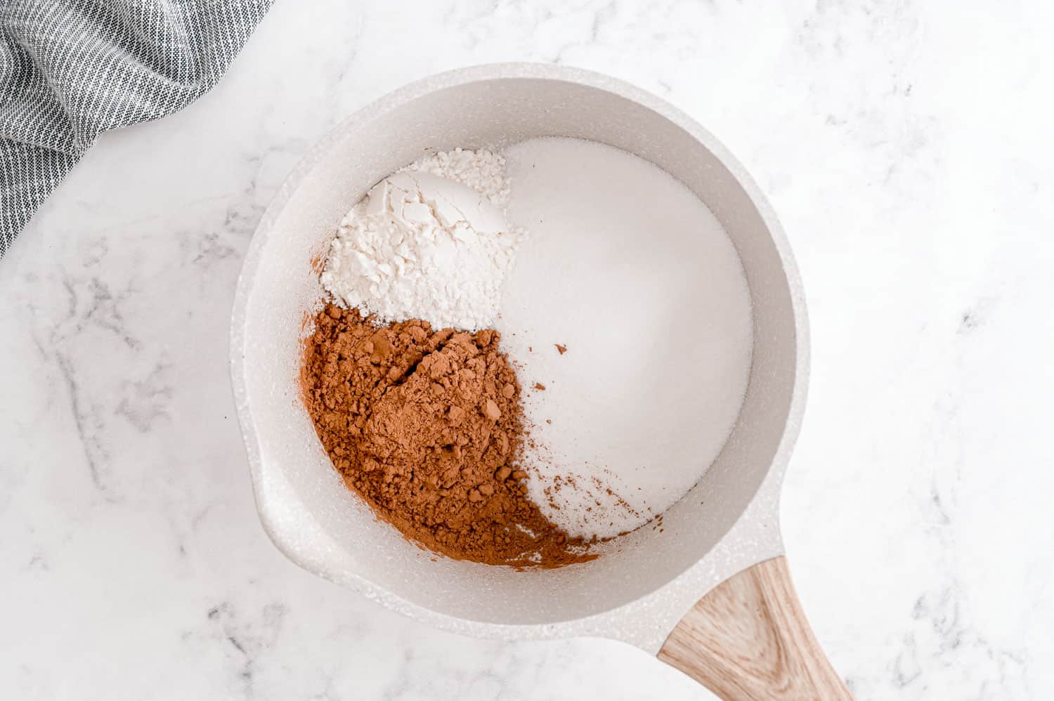 Dry ingredients in saucepan.