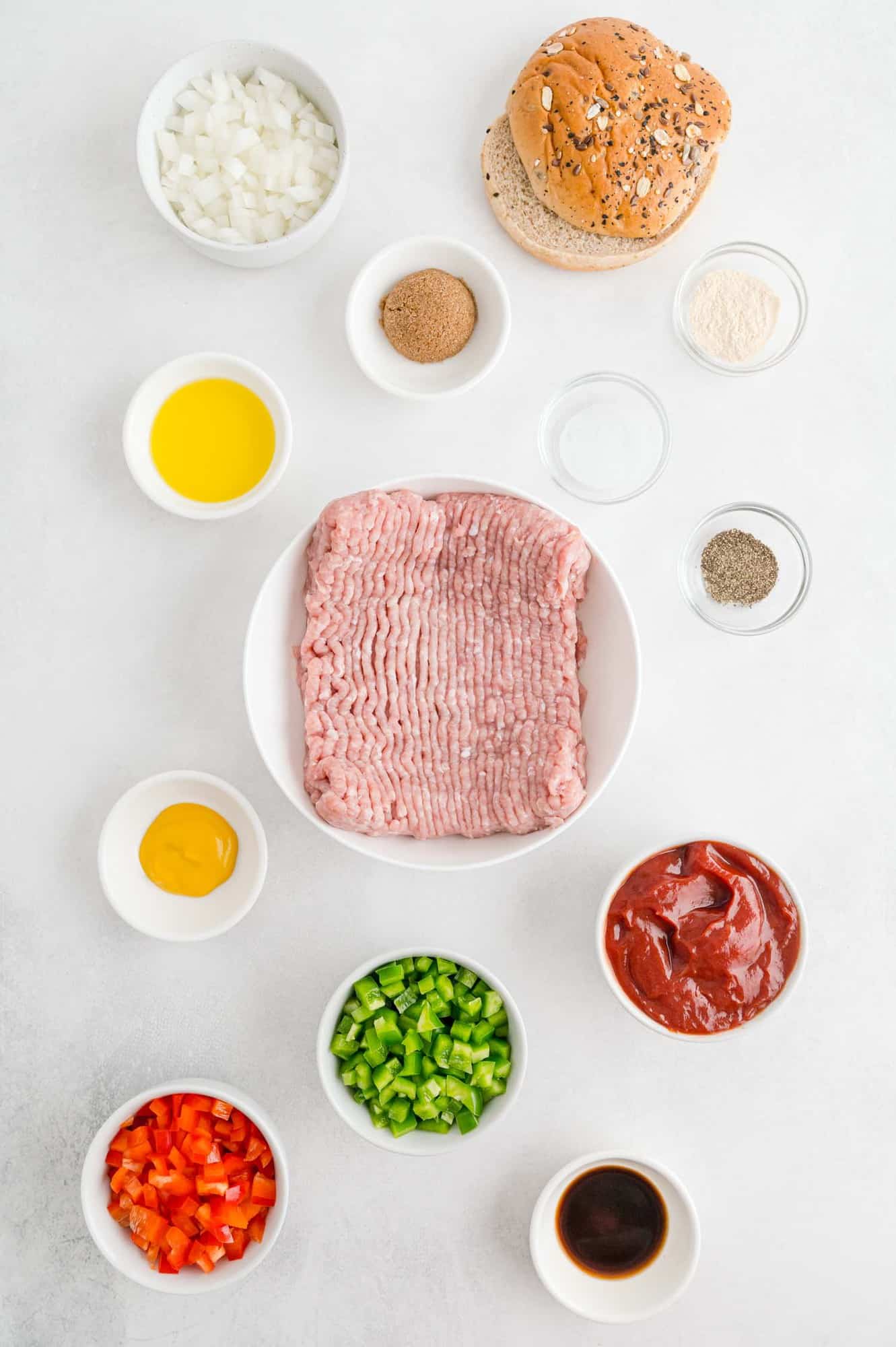 Overhead view of ingredients needed for recipe, including ground turkey.