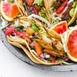 Close up of fish taco in a double corn tortilla.