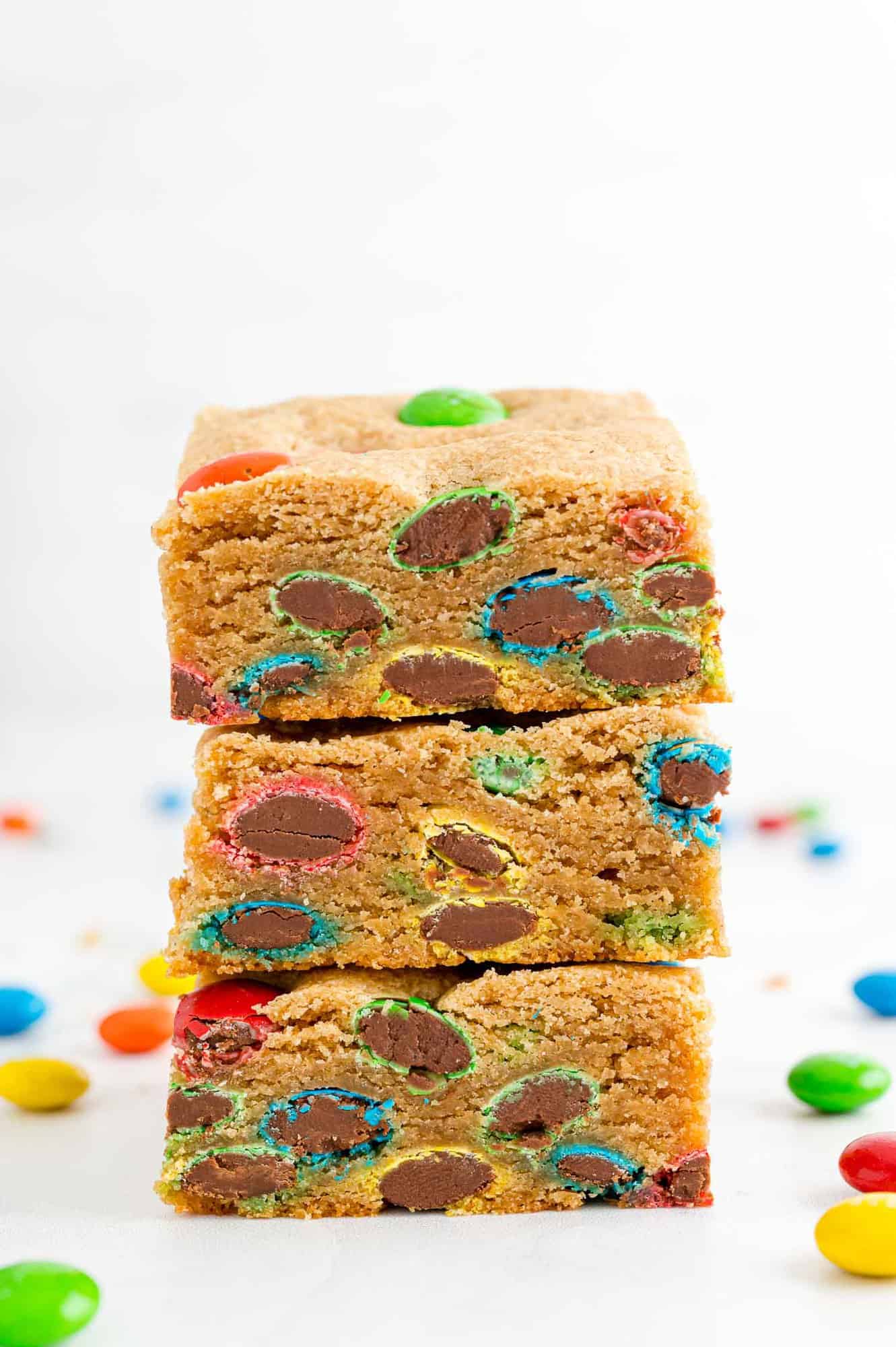 Stack of three peanut butter bars with M&Ms.