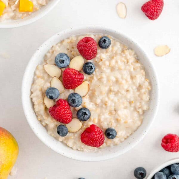 Crockpot oatmeal topped with raspberries, blueberries, almonds.