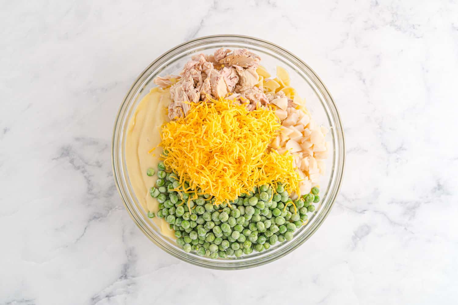 Ingredients in a large glass mixing bowl.