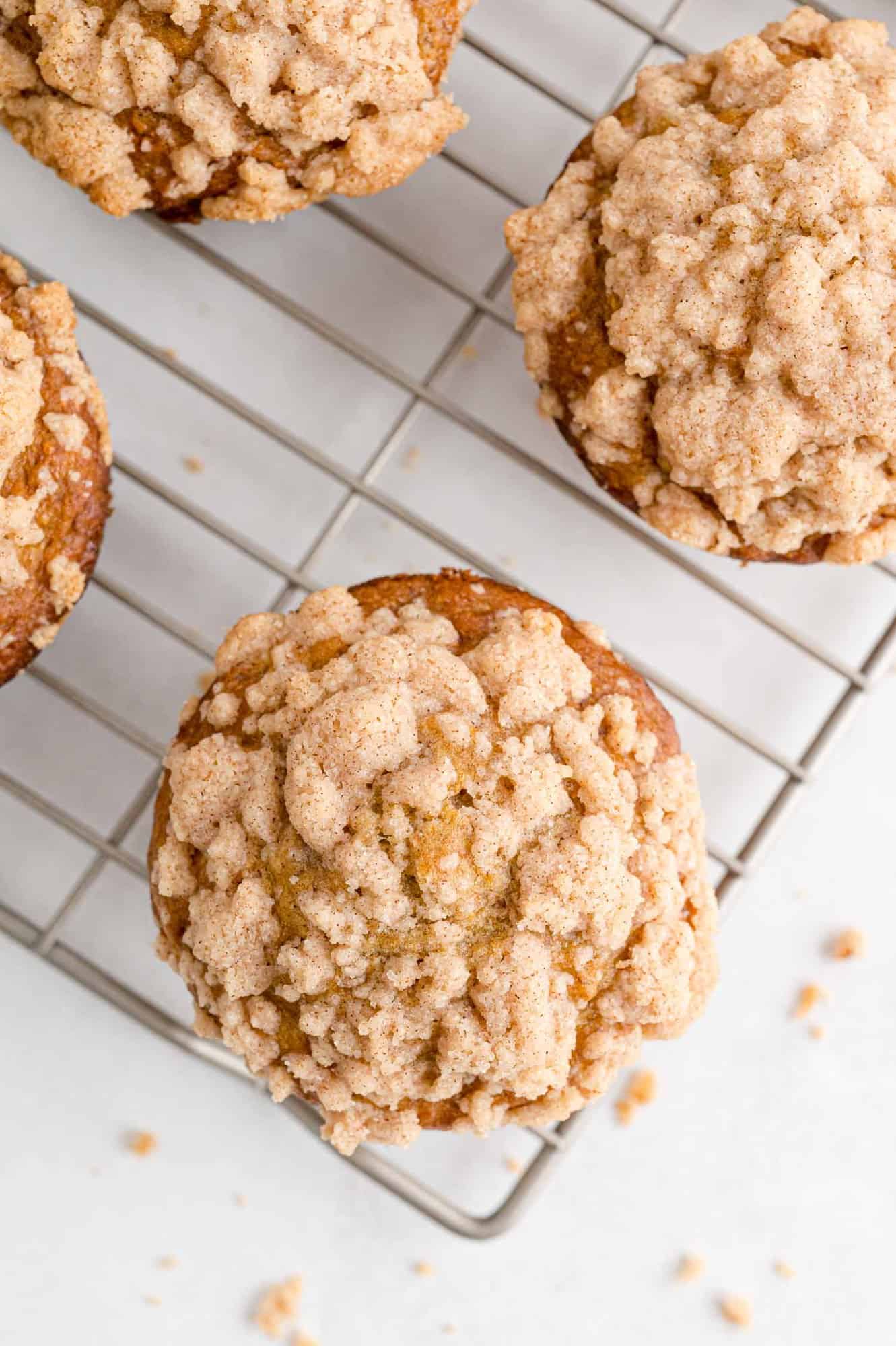 Overhead view of banana muffins with streusel. 