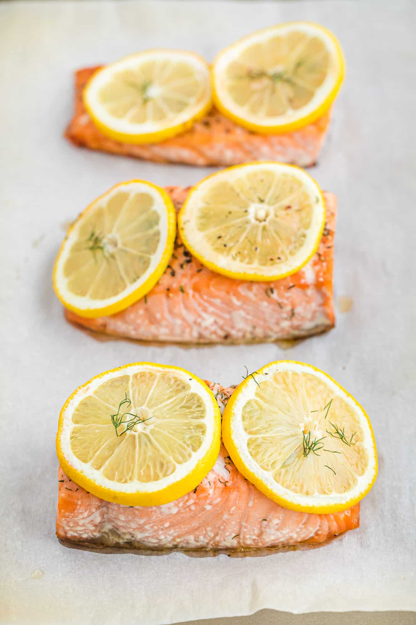 Baked salmon on a sheet pan.