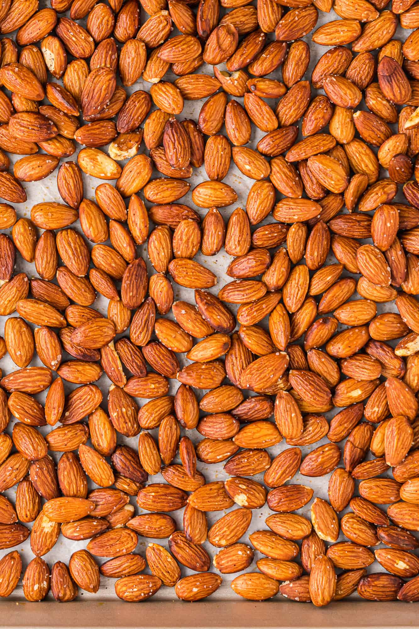 Close up of almonds filling frame of photo.