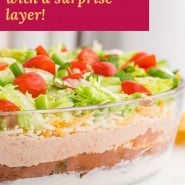Dip, text overlay reads "7 layer dip, with a surprise layer!"