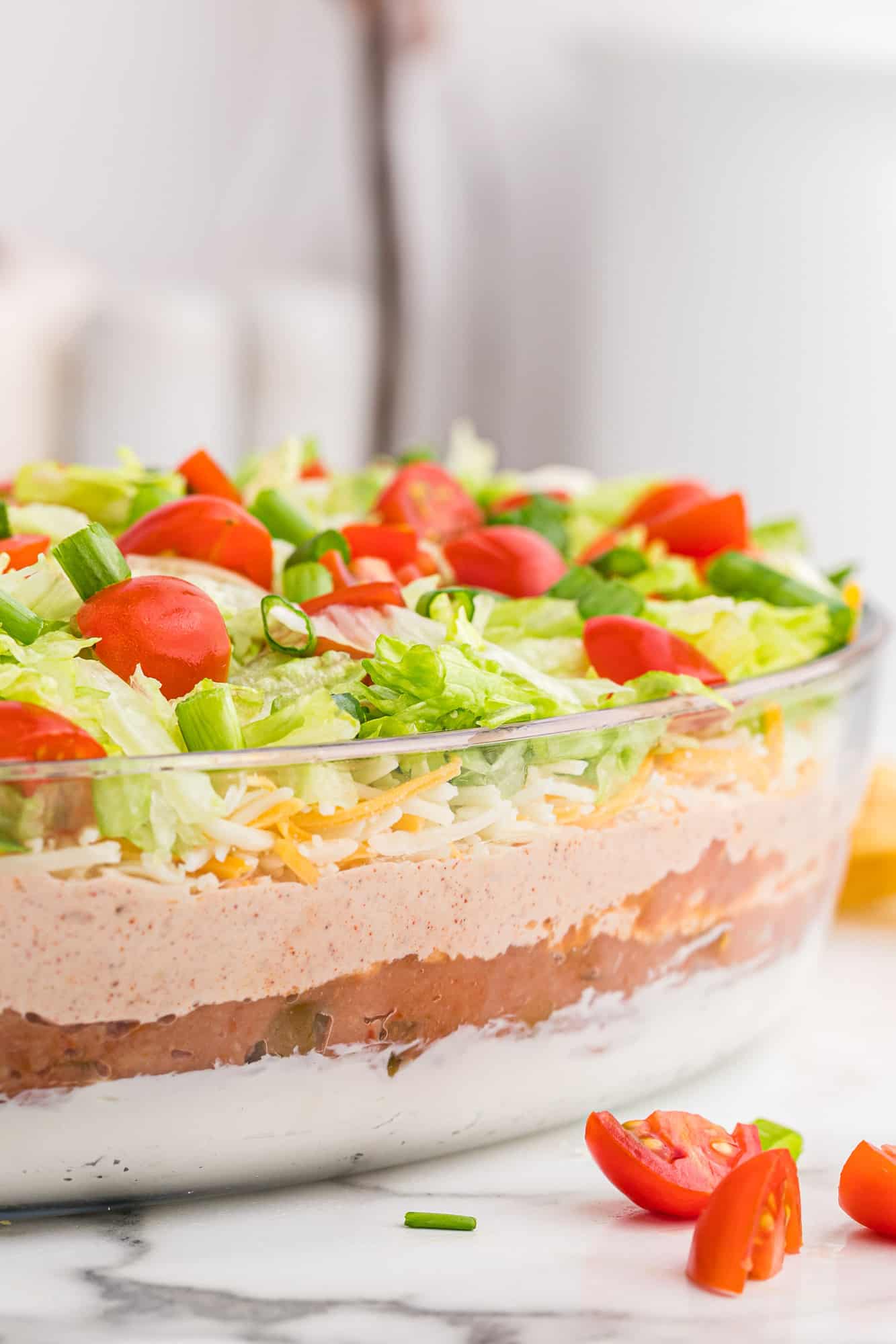 Glass dish showing 7 layers of dip.