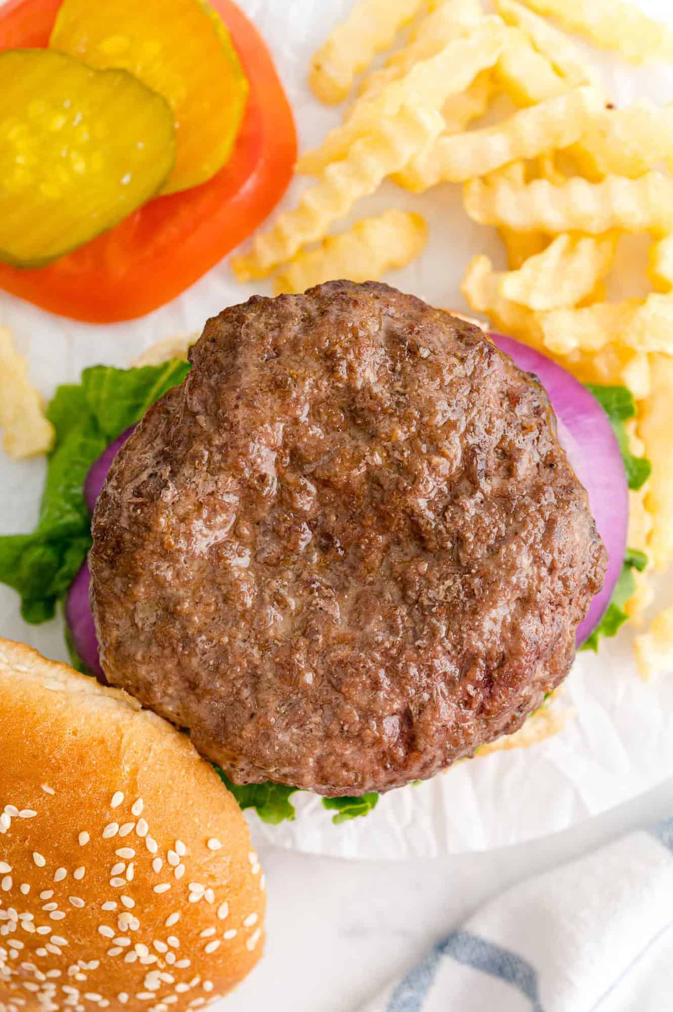 Overhead view of open faced burger.