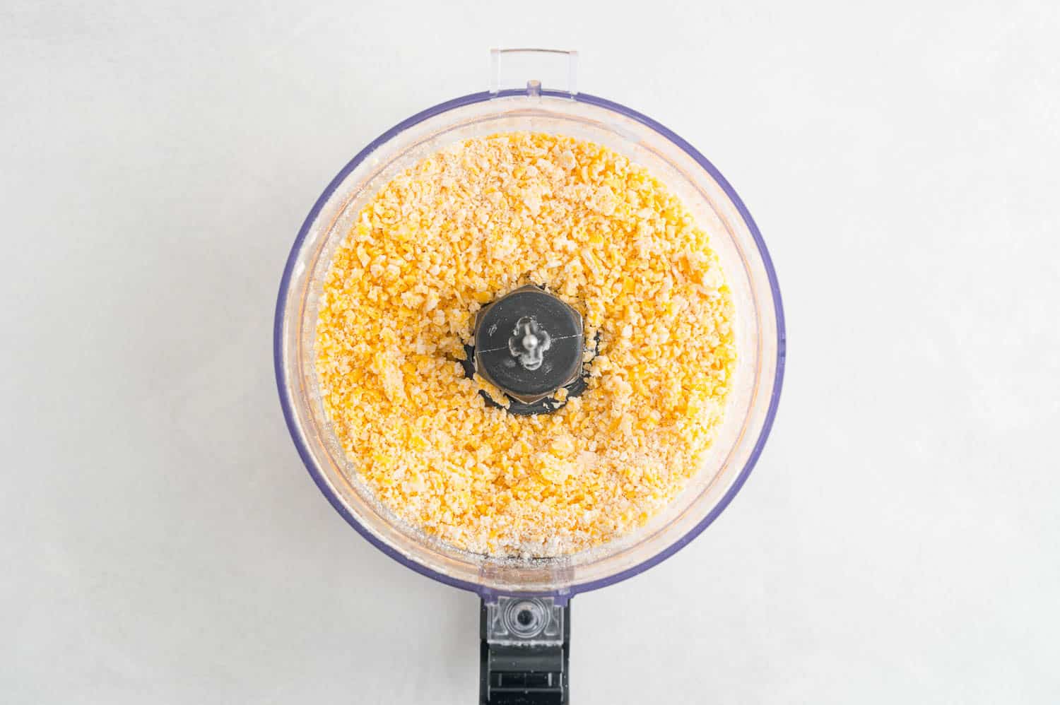 Coarse crumb mixture in a food processor.