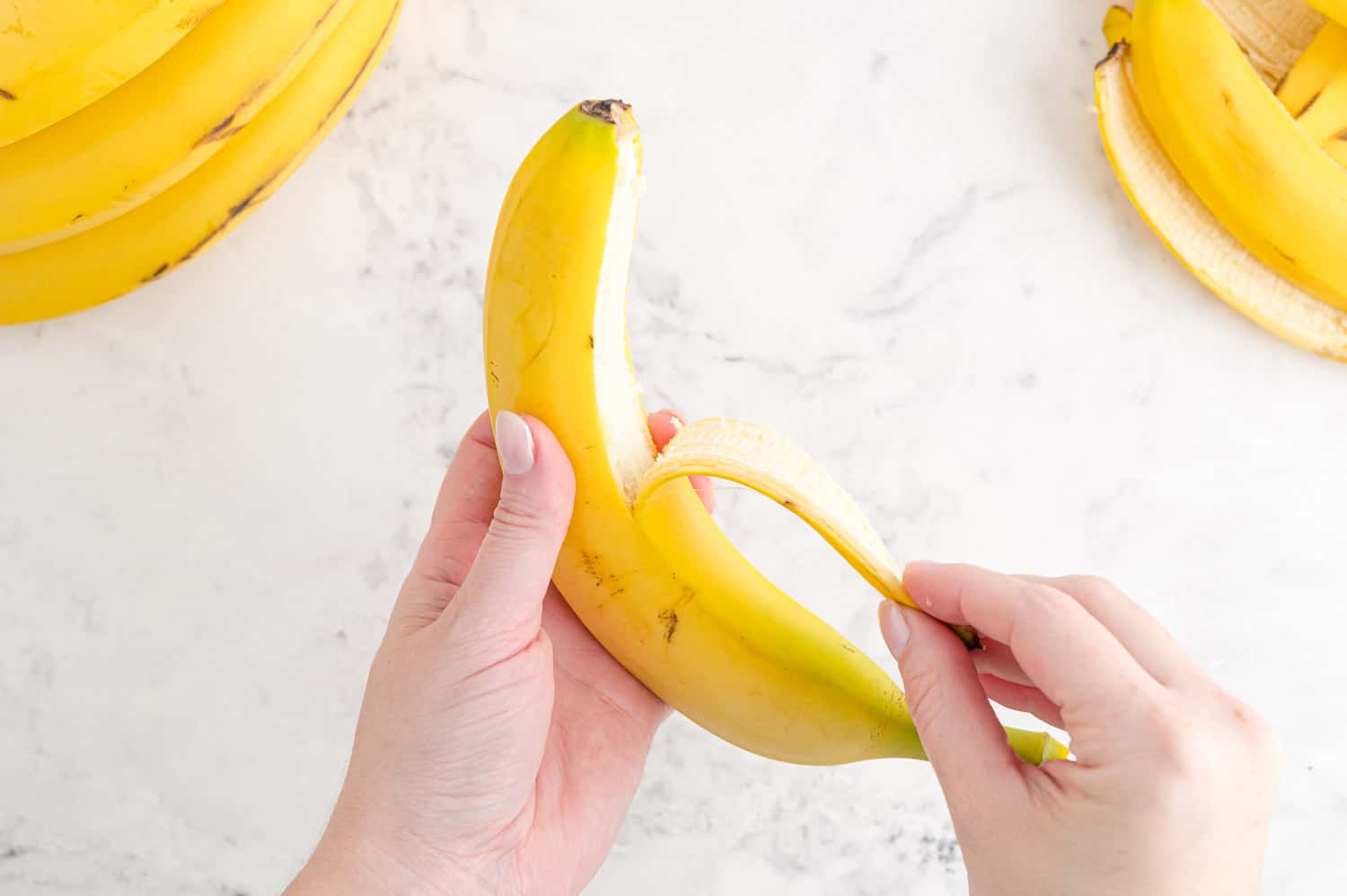 Banana being peeled.