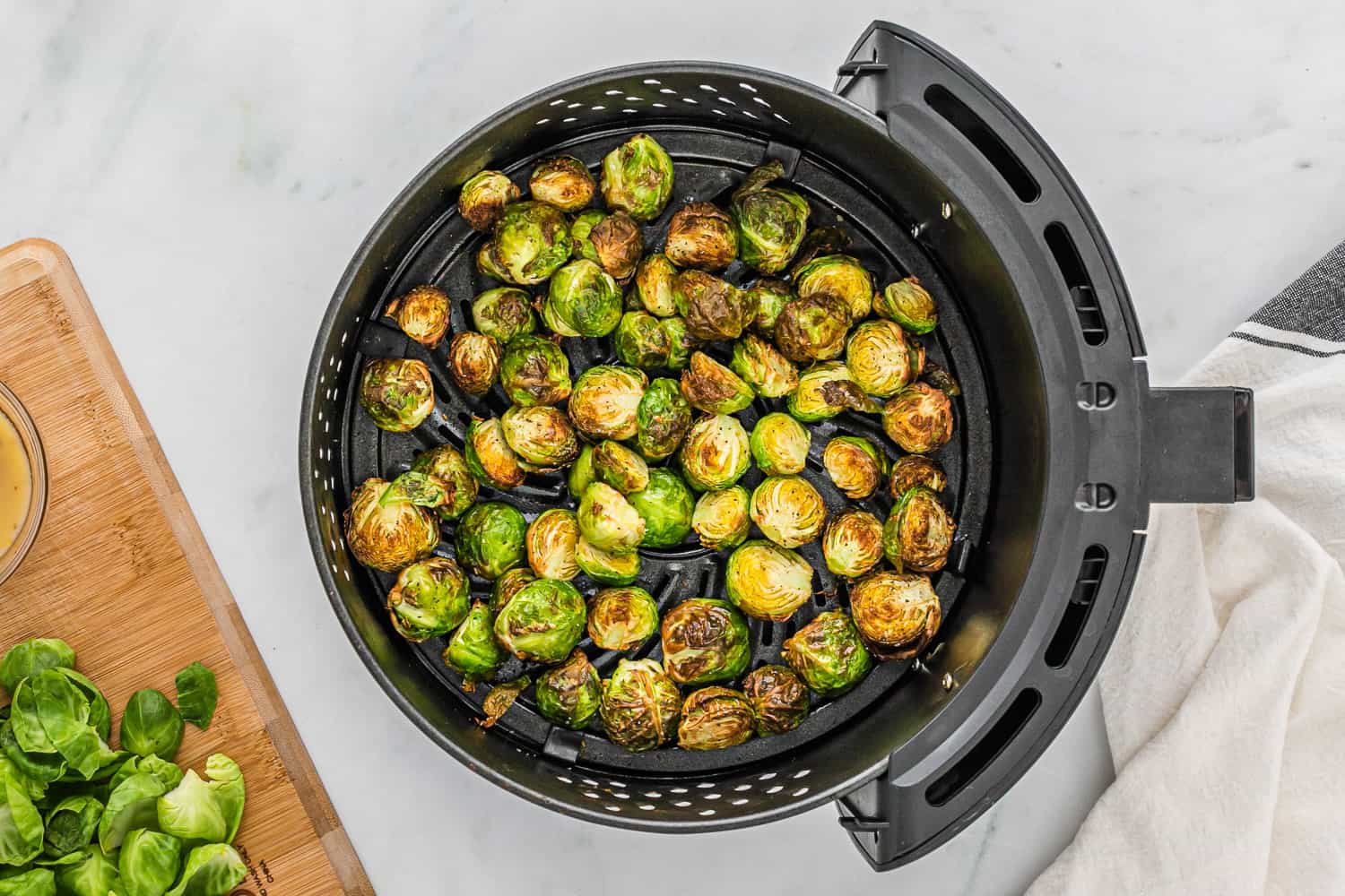 Cooked Brussels sprouts in an air fryer.