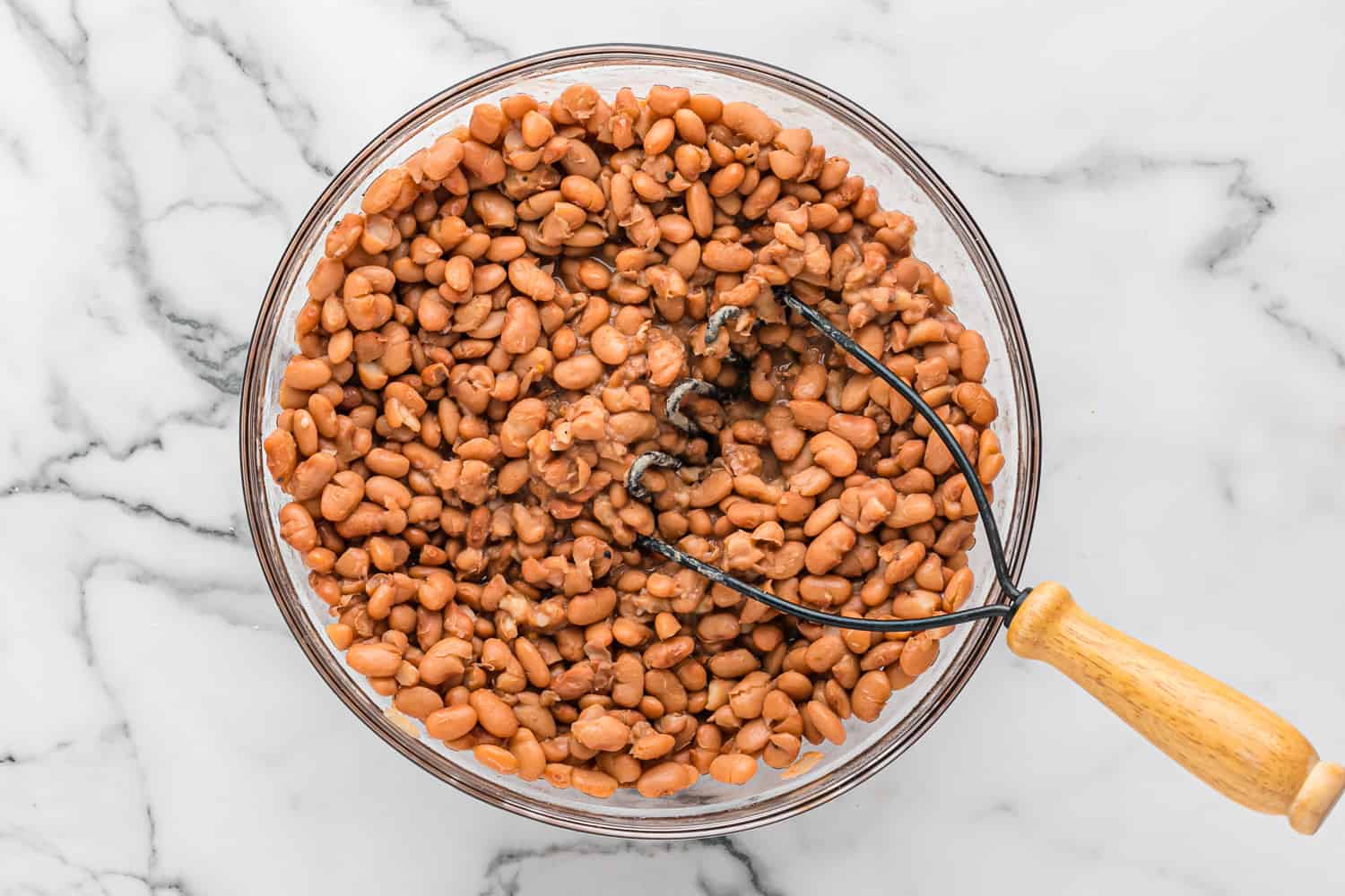 Beans being mashed.