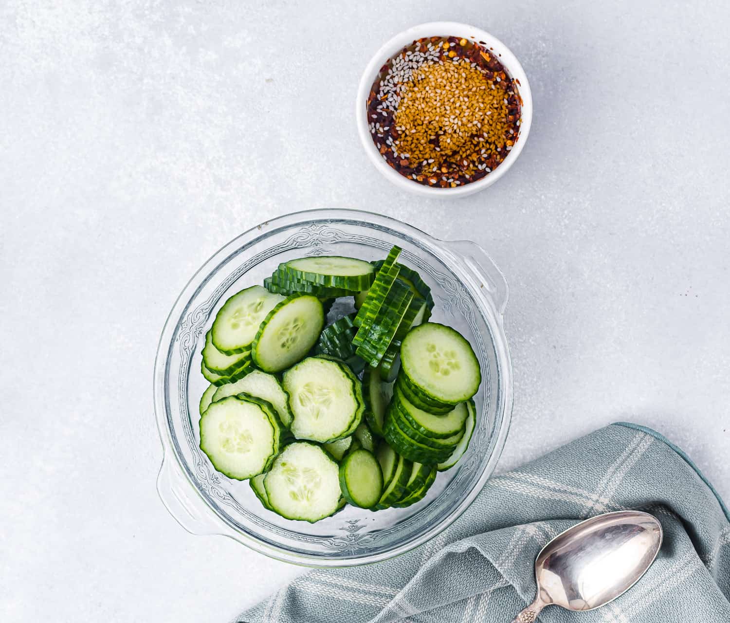 Sliced cucumbers in a bowl.