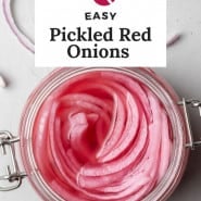 Bright pink onions in a jar, text overlay reads "easy pickled red onions."