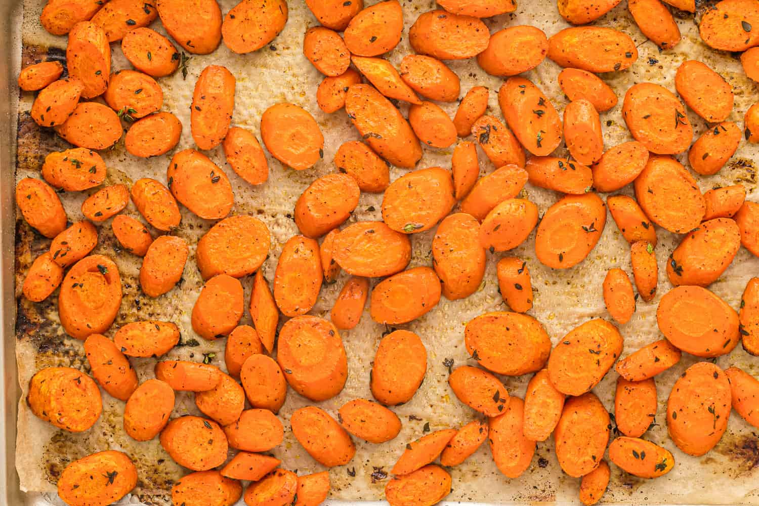 Close up view of roasted sliced carrots.