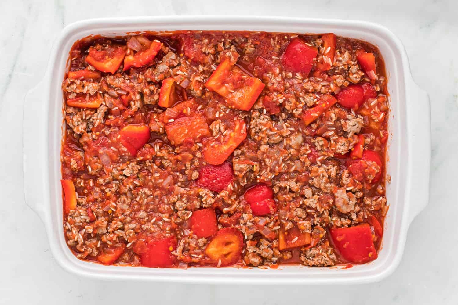 Stuffed pepper casserole before baking.