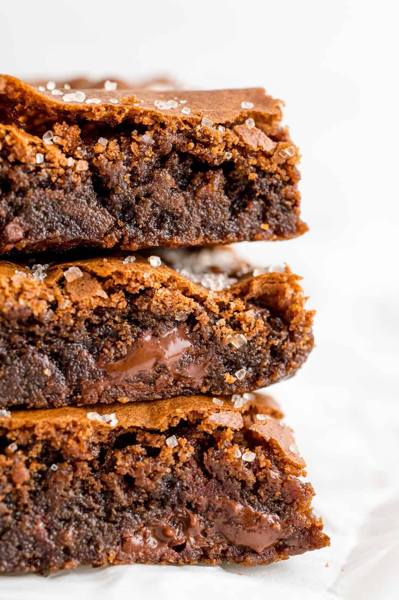 Close up of a stack of three brownies.