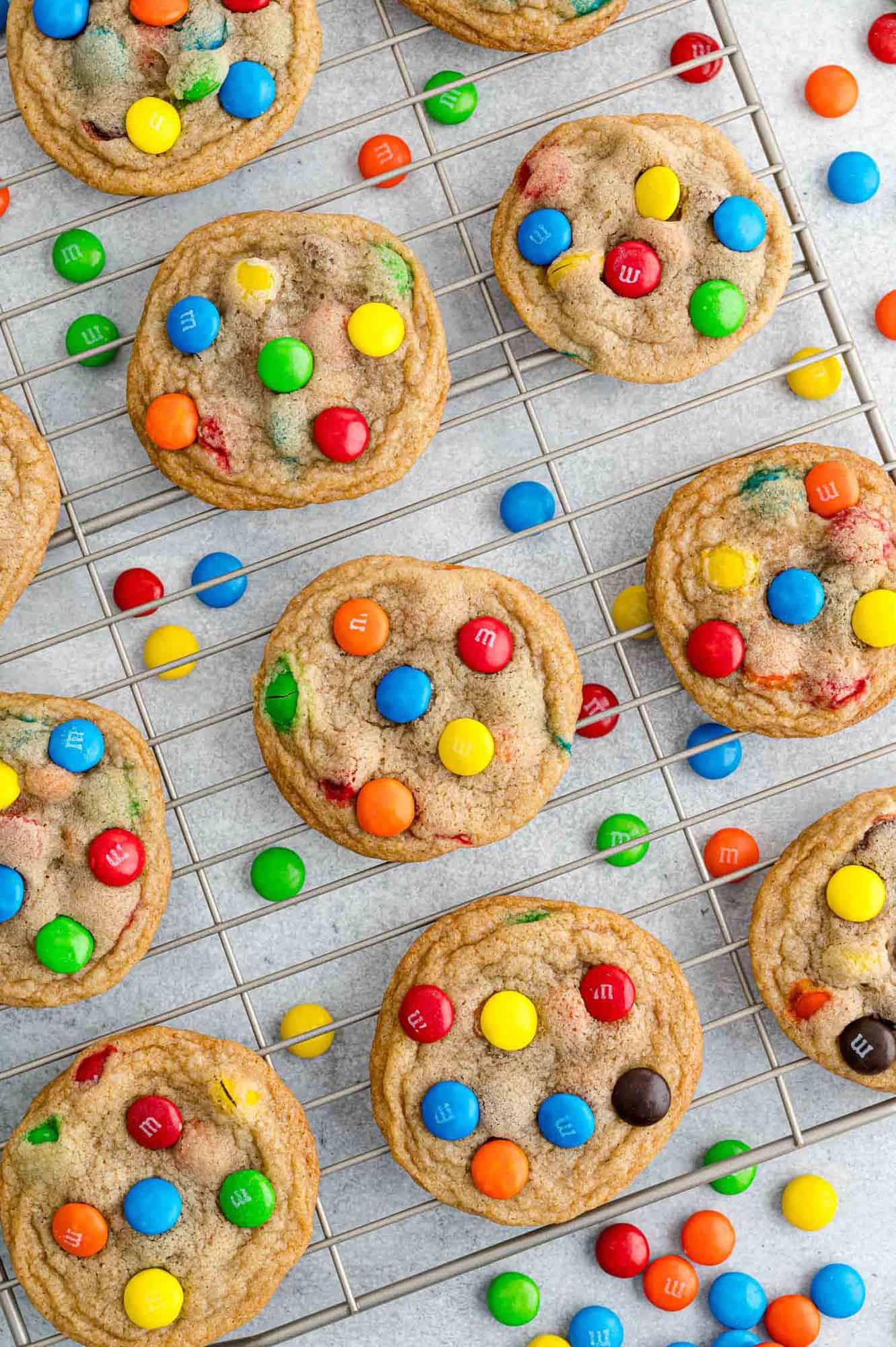 M&M Cookies on a wire baking rack.