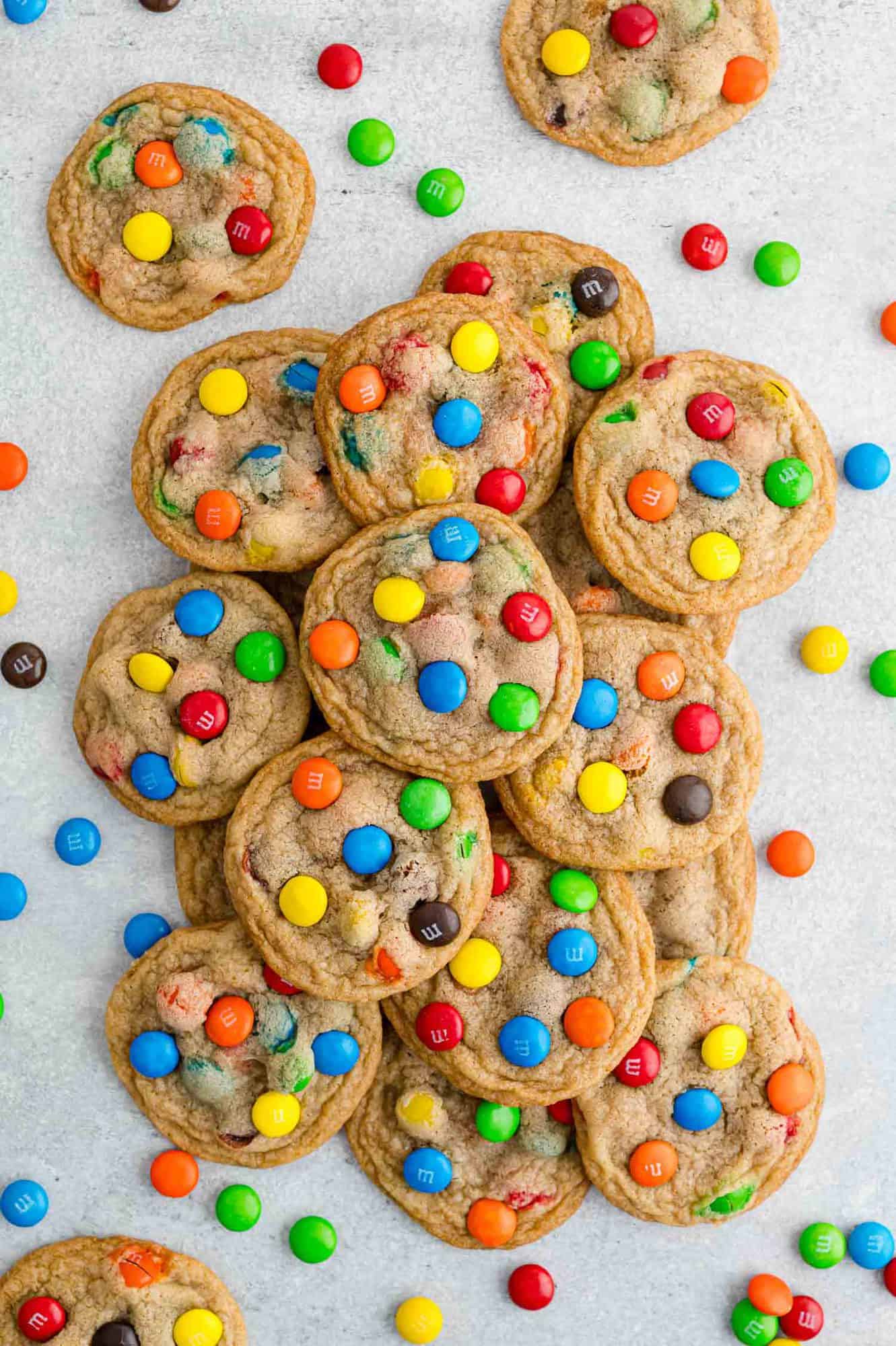 Large pile of cookies with M&Ms.