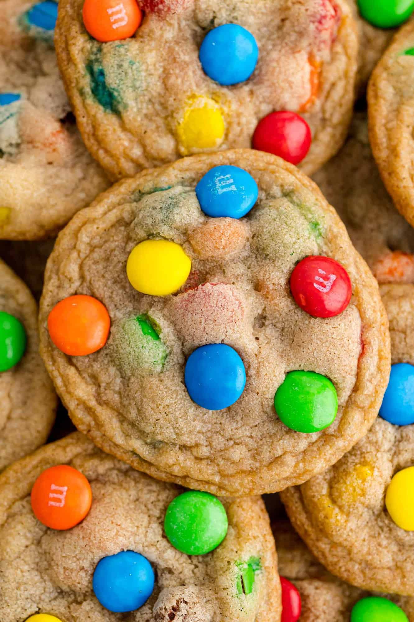 M&M cookie on top of additional M&M cookies.