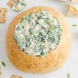 Spinach dip in a bread bowl.