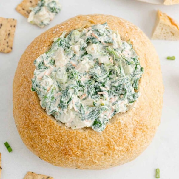 Spinach dip in a bread bowl.