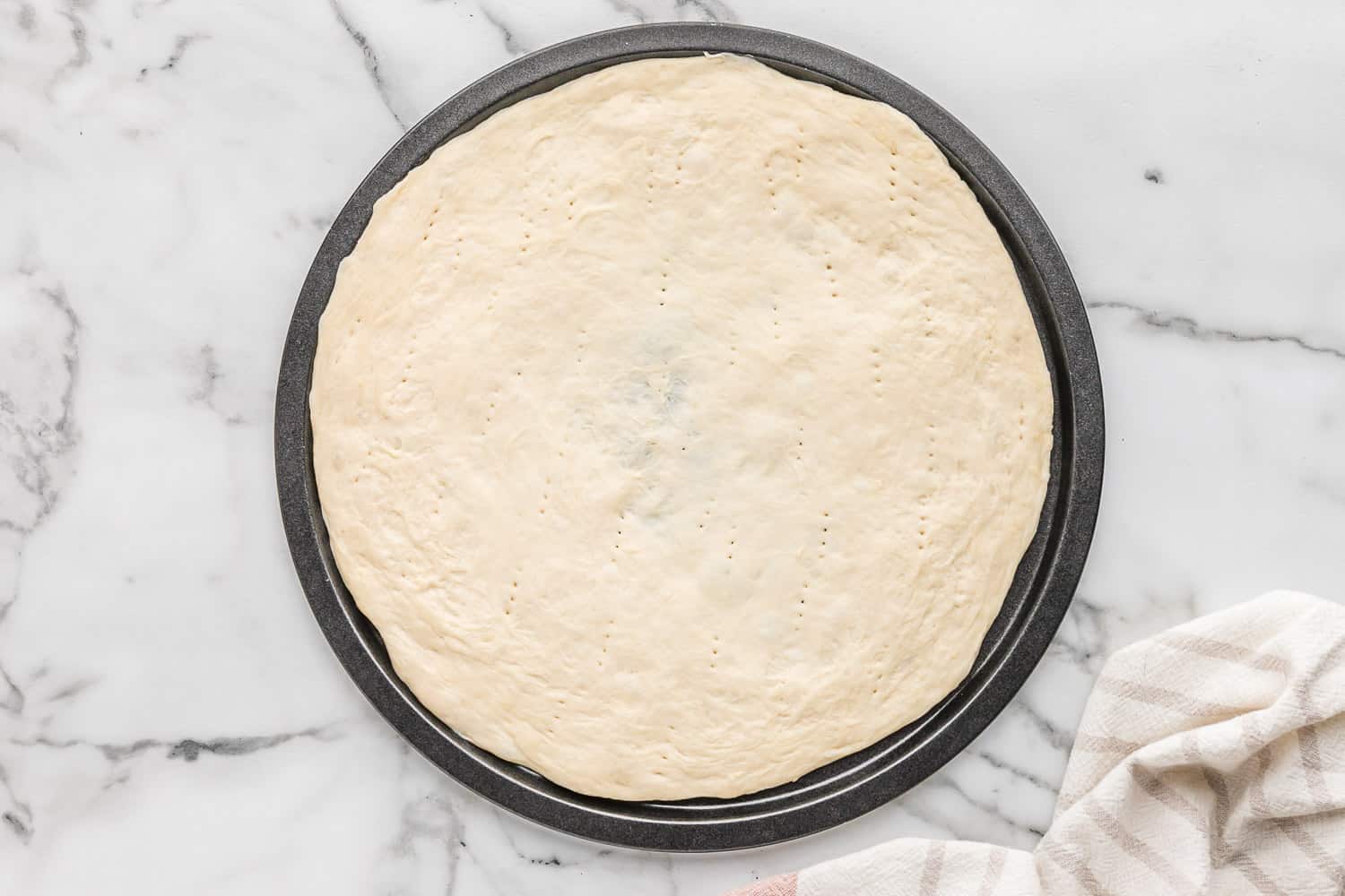 Untopped pizza dough.