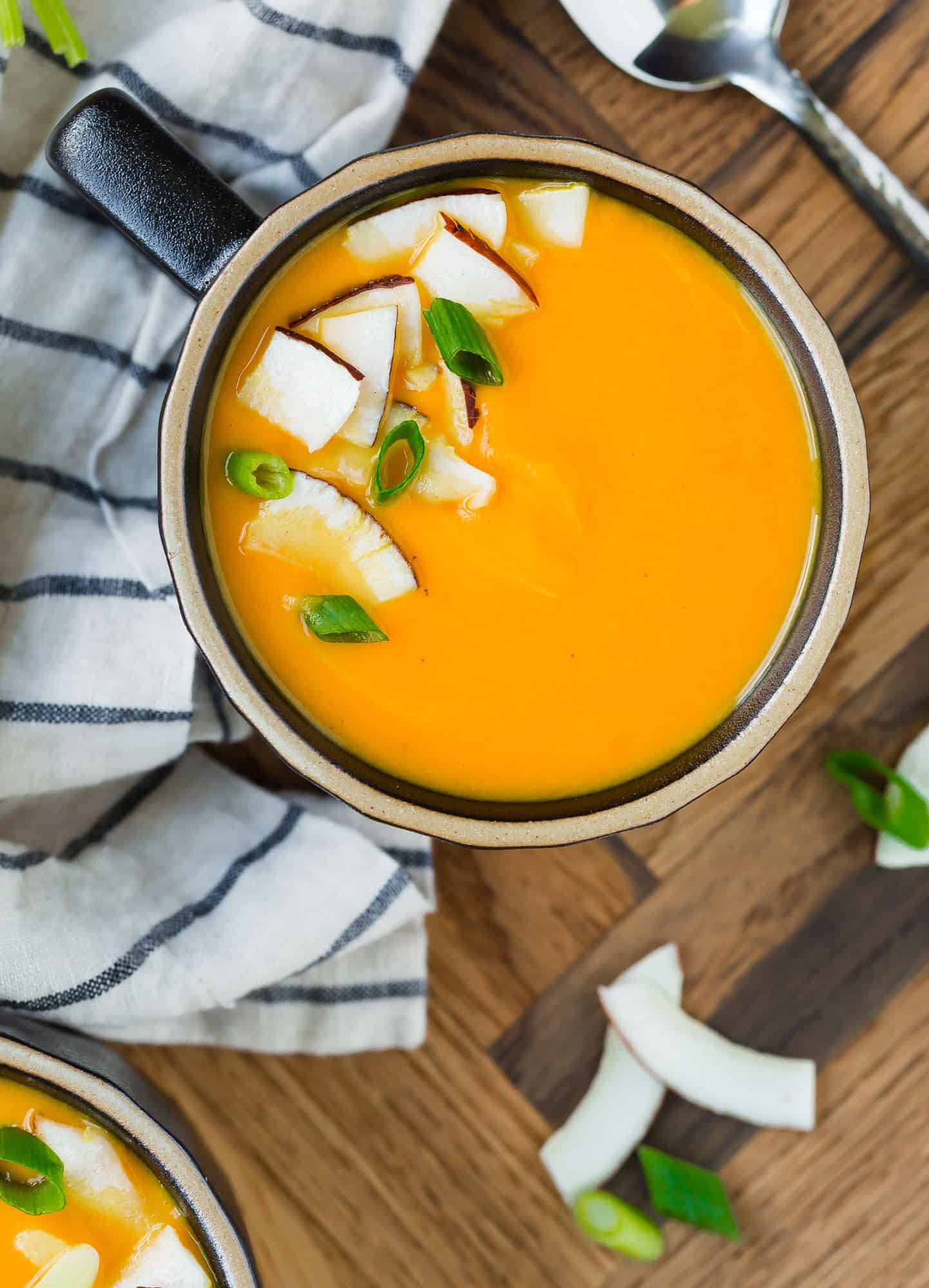 Close up image of creamy carrot soup.
