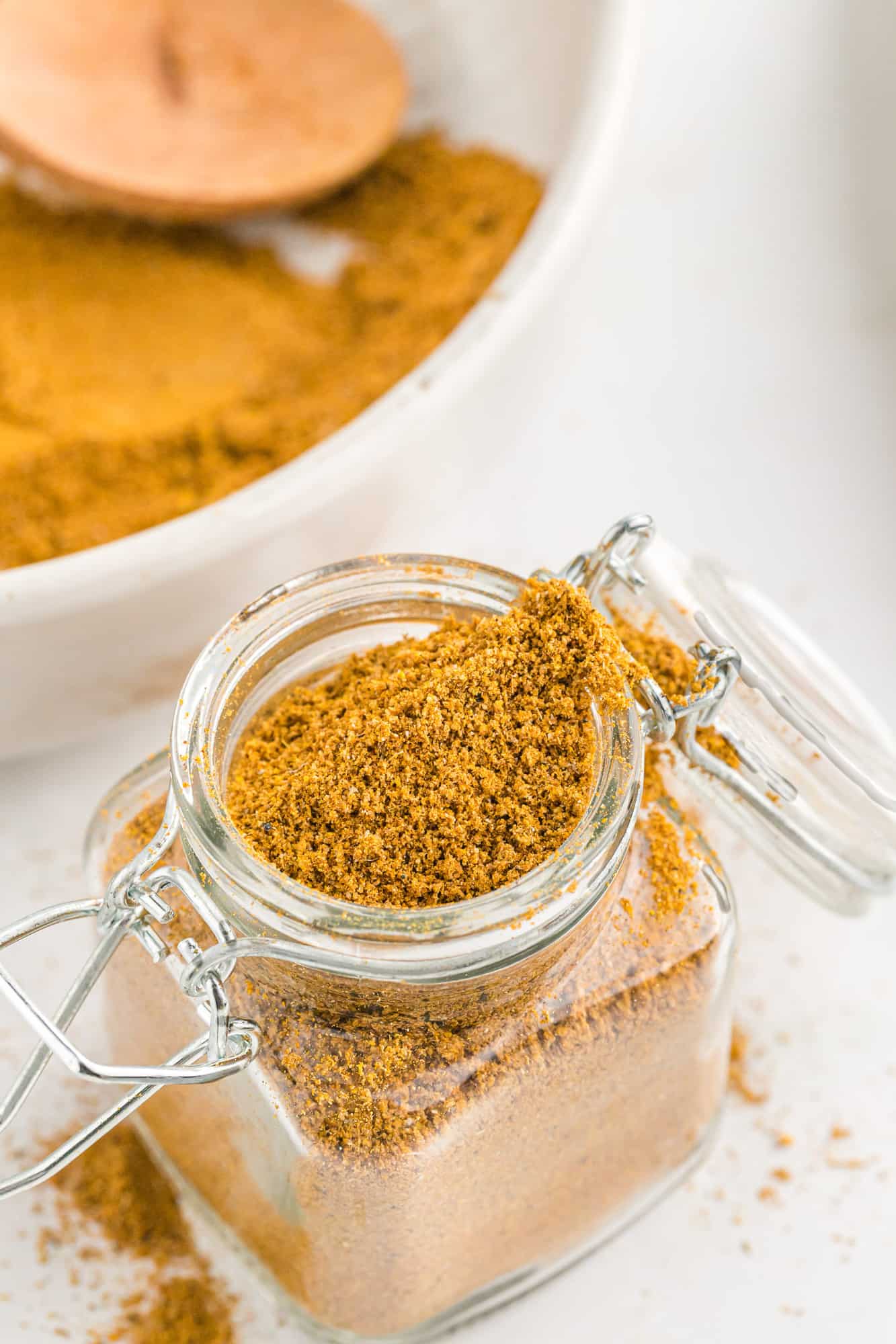 Curry powder blend in a small glass jar.