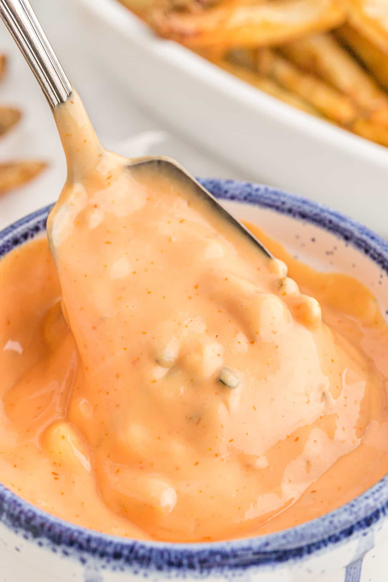 Light orange sauce with a few small chunks.