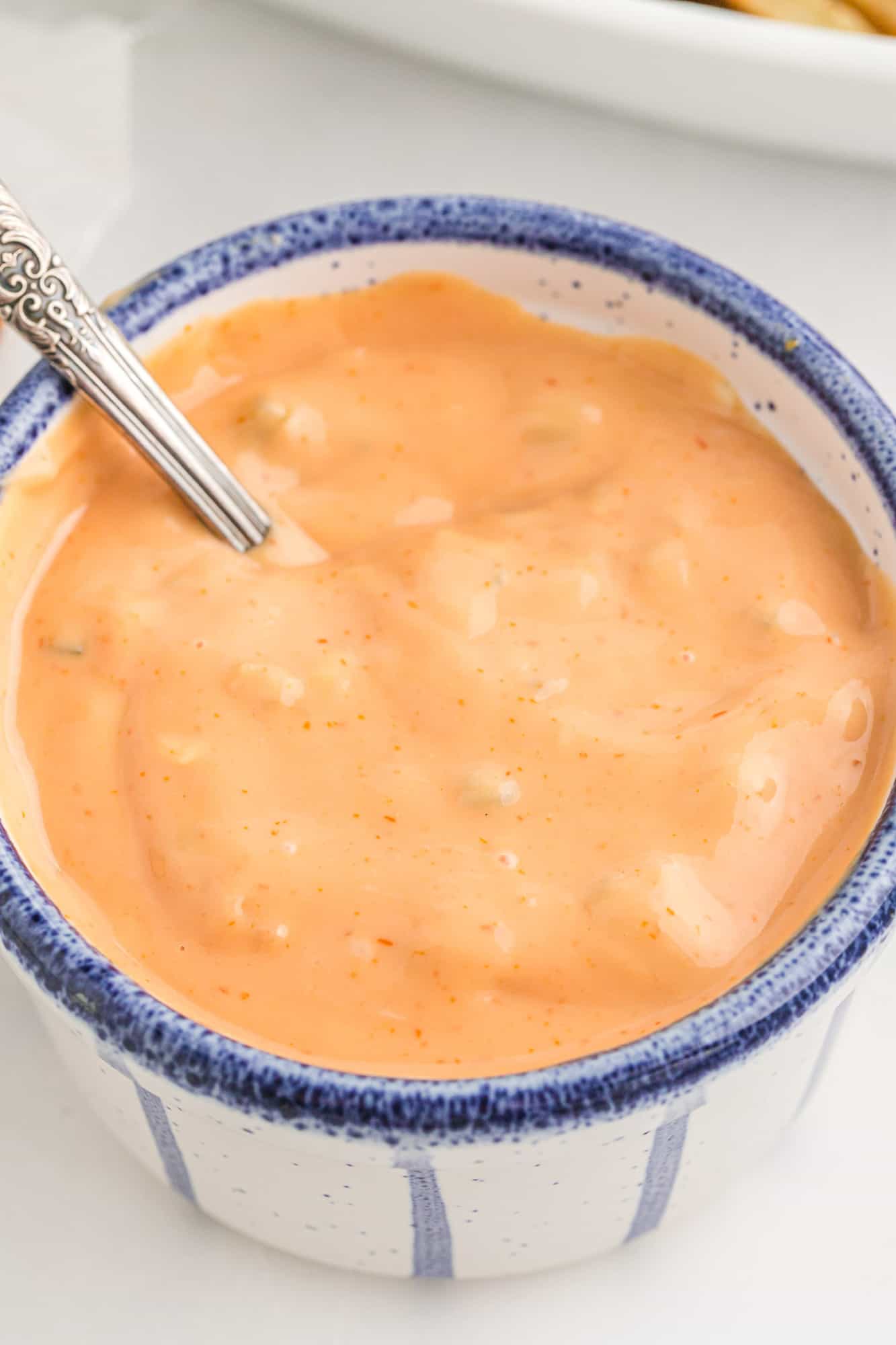 Fry sauce in a small blue and white bowl.