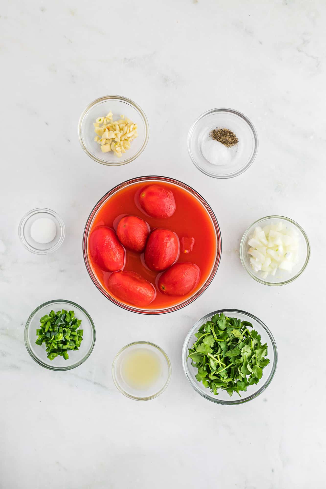 Ingredients needed in separate small clear glass bowls.